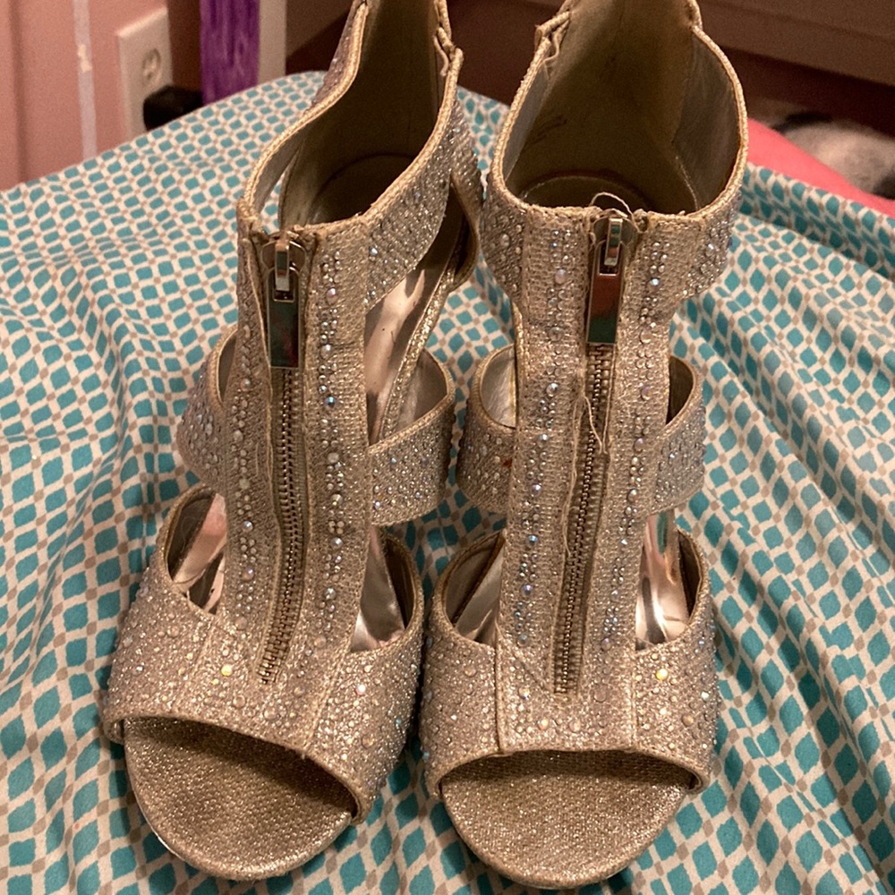 Silver slippers size eight in half